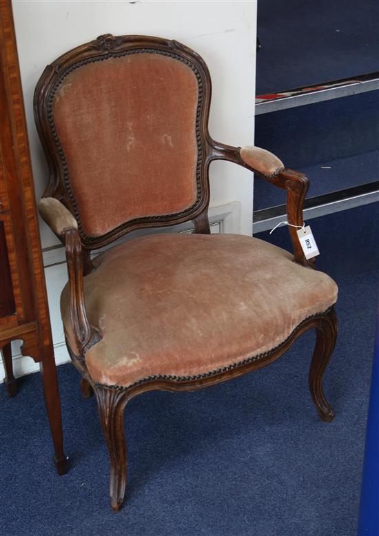 A pair of 19th century French walnut fauteuils